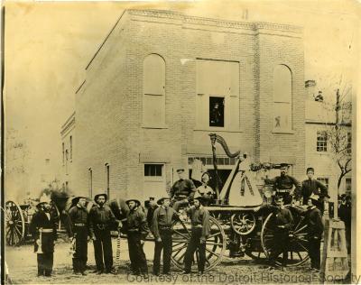 The firefighters of Detroit's K.C. Barker Company No. 4 posed with their engine decorated for a Lincoln memorial parade